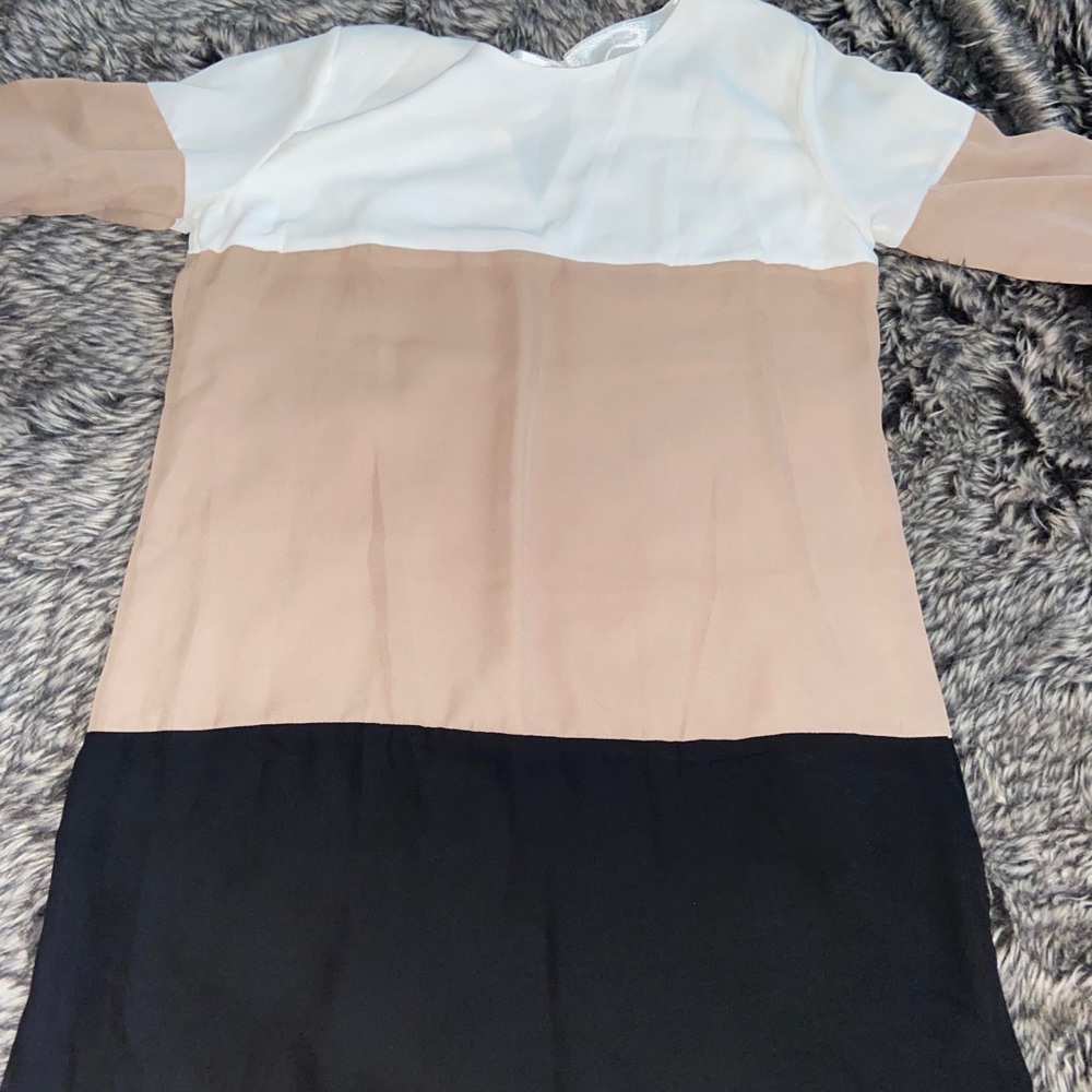 White , Black and Tan flare shirt